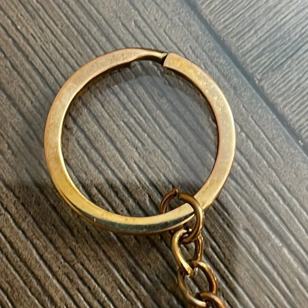 Orly “Do What Makes You Happy” Brass Keyring
